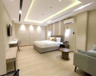 Belajandro Hotel Angeles City - Angeles City - Schlafzimmer