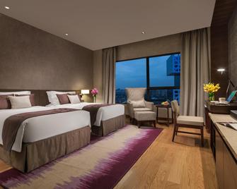 اسكوت رافلز ستي شينجدو - تشنغدو - غرفة نوم