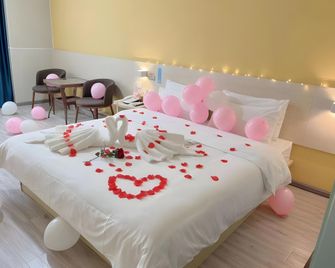 7 Days Inn Bazhong International Trade City Branch - Bazhong - Bedroom