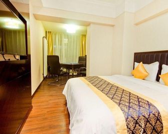 Sweetome Vacation Rentals (Xi'an Tonghuamen Metro Station) - Xi'an - Sypialnia