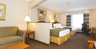 Days Inn & Suites by Wyndham La Crosse/Onalaska - Onalaska - Bedroom
