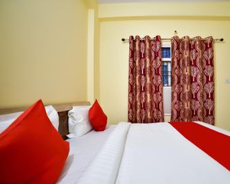 Hotel O Flagship J.d.p Guest House - Varanasi - Bedroom