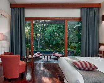 تيمبلايشن هوتل - سيم ريب - غرفة نوم