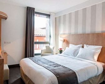 هوتل لو بير ليون - تولوز - غرفة نوم