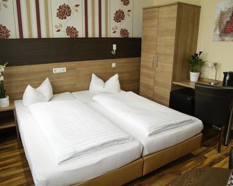 فندق بانوراما سيتي - هانوفر - غرفة نوم