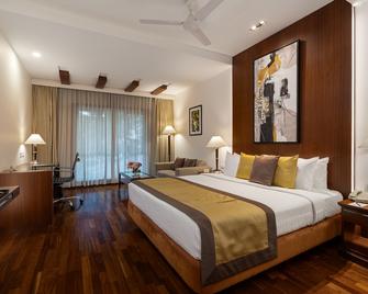 Palm Meadows Resort - Bangalore - Makuuhuone