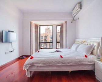 Qianfang Apartment - Nanning - Sypialnia