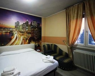 Albergo Ristorante La Bussola - Clusone - Slaapkamer