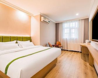Greentree Inn Tianjin Huanghe Road Guangkai - تيانجين - غرفة نوم