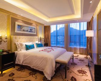 Celebrity Hotel - Xiangfan - Slaapkamer
