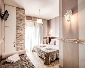Santamaria Inn - Rome - Bedroom