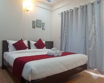 Hotel Sun Bright Residency Manipal - Manipala - Schlafzimmer