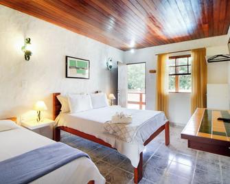 Velinn Pousada Cesar - São Bento do Sapucaí - Schlafzimmer
