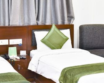 Treebo Grd Inn - New Delhi - Bedroom
