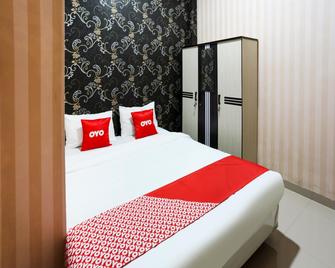 OYO 4009 Jabusimo Syariah - Jakarta - Bedroom