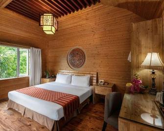 Bisheng Hot Spring Hotel - Huanggang - Camera da letto