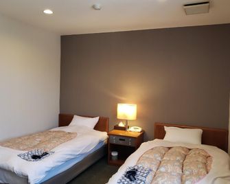Businesshotel Shell - Ōmihachiman - Schlafzimmer