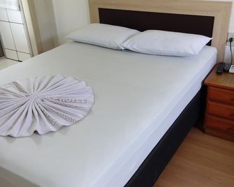 Hotel Figueira Palace - Dourados - Habitación