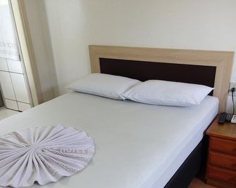 Hotel Figueira Palace - Dourados - Habitación