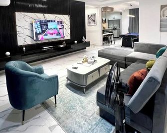 Somewhere Apartments - Abuja - Living room