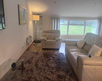 Captivating 2 Bed Apartment in Newhouse - Airdrie - Living room