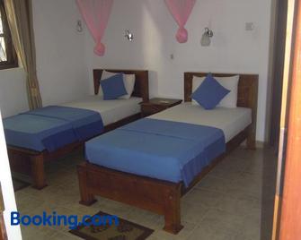 Devi Tourist Home - Polonnaruwa - Bedroom