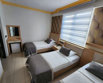 Antalya Konyaalti Guenduez Otel - Antalya - Bedroom