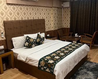 Hotel Golden Palm By Rattan's 1925 - Jammu - Schlafzimmer