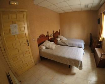 Hostal La Casa de Enfrente - Málaga - Bedroom