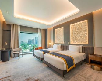 Movenpick Hotel Al Zaytoon Baghdad - 巴格達 - 臥室