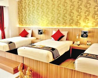 Grand Hap Hotel - Surakarta City - Bedroom
