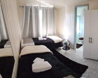 أبارتامنتو فونسيونال - كاسكافيل - غرفة نوم