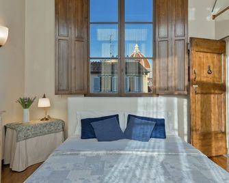 Palazzo Uguccioni Apartments - Флоренція - Спальня