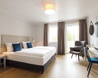 Koopmanns Hotel und Lädchen - Gohren - Soveværelse