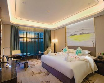 Royale Tower Hotel - Chenzhou - Schlafzimmer