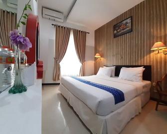 Queen City Hotel - Banjarmasin - Slaapkamer