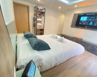 فوتوروتيل سبا جاردن - غرناطة - غرفة نوم