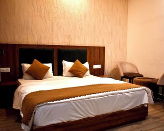 Hotel Rose Inn Haridwar - Haridwar - Bedroom