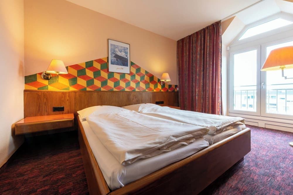 enjoyHotel garni Korntal Stuttgart - קורנטאל-מונכינגן - חדר שינה