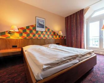 enjoyHotel garni Korntal Stuttgart - Korntal-Münchingen - Habitación