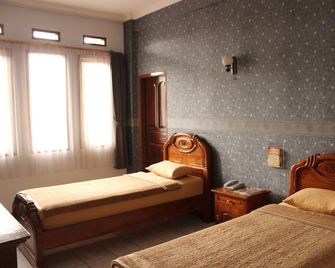 Lingga Hotel - Băng-đung - Phòng ngủ