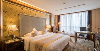 Sunshine Hotel And Resort Zhangjiajie - Zhangjiajie - Bedroom