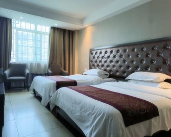 Roman Holiday Hotel - Huaihua - Bedroom