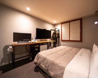 Daejeon Yongjeon Hotel Seattle - Daejeon - Bedroom