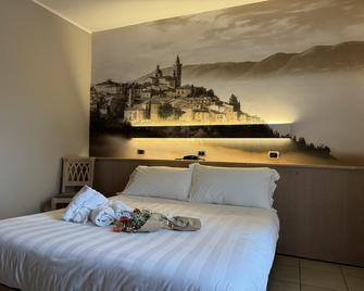 Hotel Cladan - Santa Maria degli Angeli - Habitación