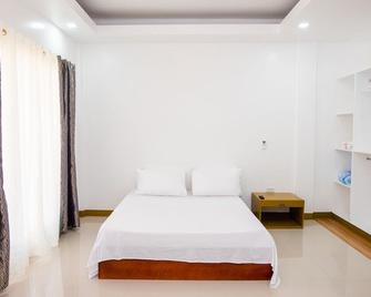 E & C Tourist Inn - 杜馬蓋地 - 臥室
