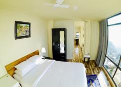 The Cliff House Serviced Apartment with Great Views - Aizawl - Bedroom