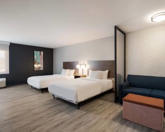 Everhome Suites Corona - Corona - Schlafzimmer