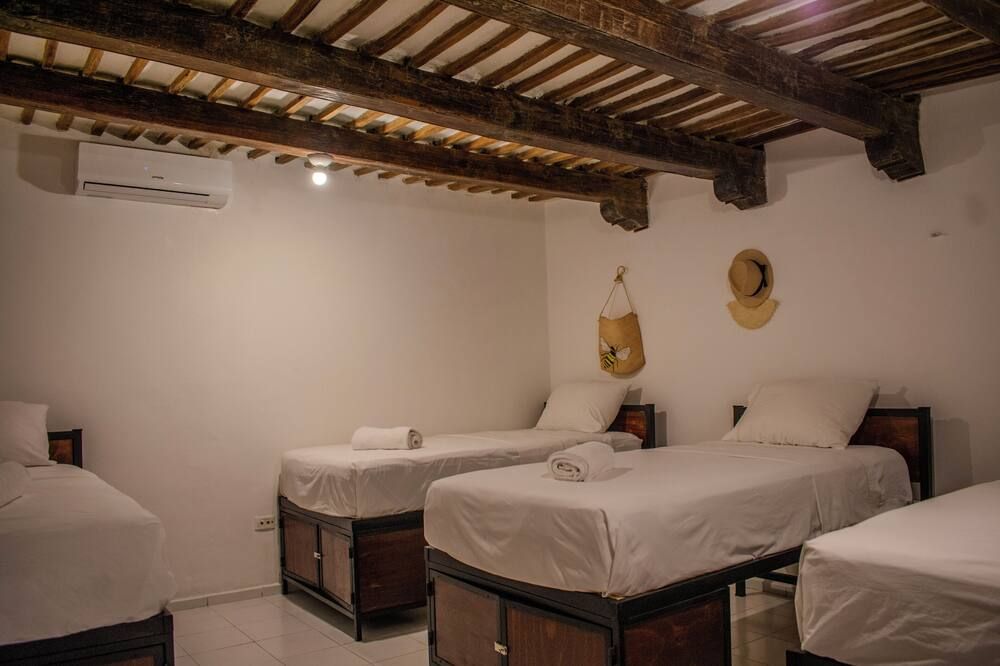 Hostal 66 - מרידה - חדר שינה