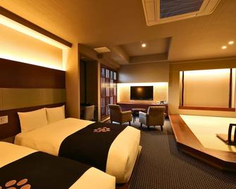 ريوتي ماتسويا هونكان سويزينجي - كوماموتو - غرفة نوم